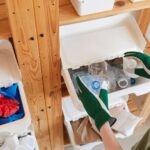 cleaning and organizing garage storage bins